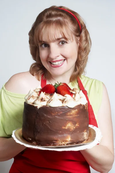 Die schönen Frauen mit der Torte in der Hand — Stockfoto