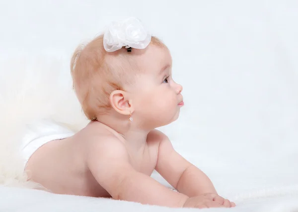 Portrait newborn baby lying in bed — Stock Photo, Image