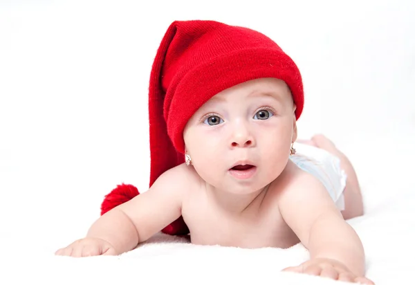 Söta nyfödda barn i en hatt — Stockfoto