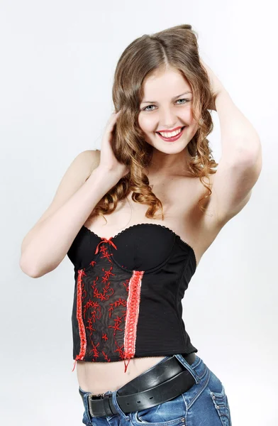 Portrait of a beautiful teenager girl with long curly hairs — Stock Photo, Image