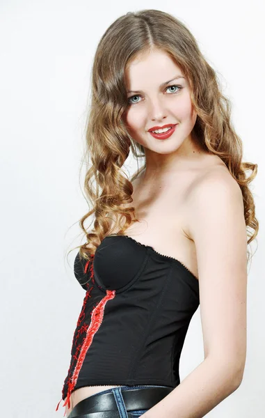 Portrait of a beautiful teenager girl with long curly hairs — Stock Photo, Image