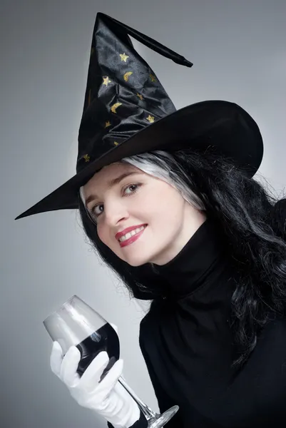 Portrait of a cute witch with hat with a Wine glass — Stock Photo, Image