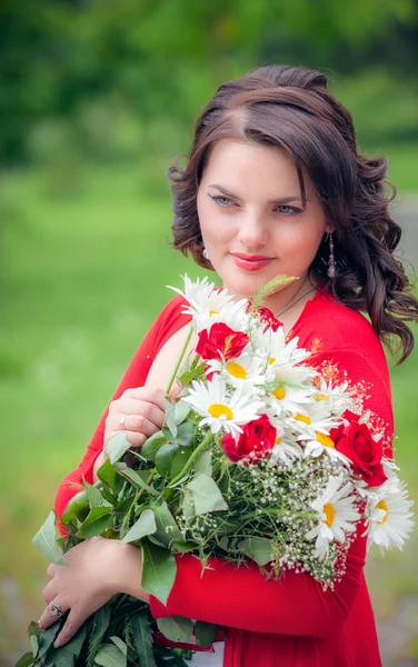 Happy smiling woman with flower — Stock Photo, Image