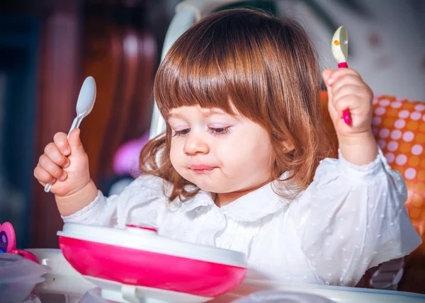 Eating baby girl — Stock Photo, Image