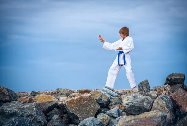 Boy training karate — Stock Photo, Image