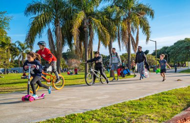 BUENOS AIRES, ARGENTINA - MAY 24, 2022: resting people in Parque Deportivo Costanera Norte