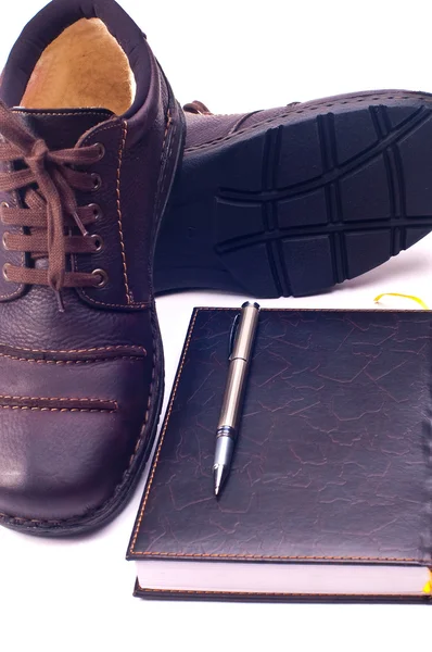 Shoes and notebook — Stock Photo, Image