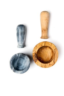 hand kitchen appliances on a white background. wood and stone mortar and pestle. View from above.