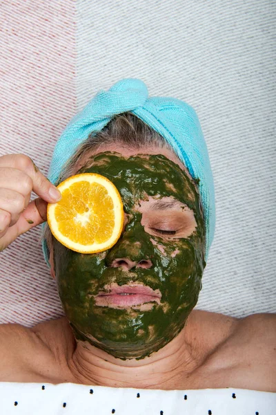 Sheet Lies Woman Towel Her Hair Clay Face Mask Orange —  Fotos de Stock