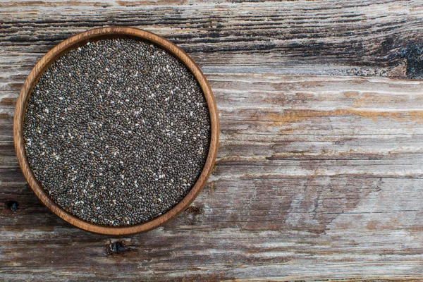Chia Seeds Wooden Bowl Textured Board Top View Copy Space — Stock Photo, Image
