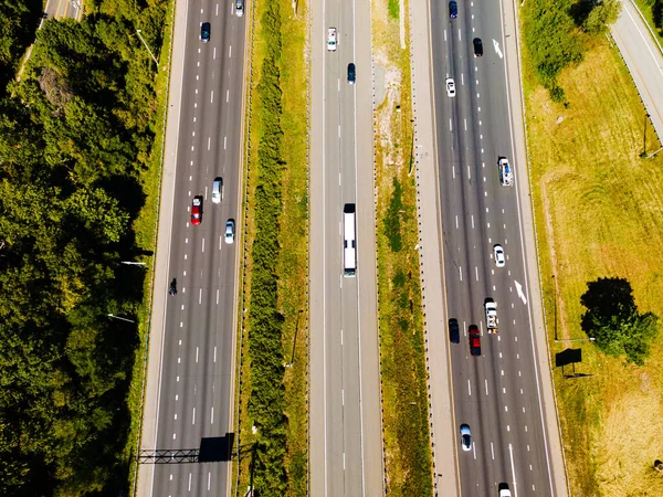 multi-lane highway with bird\'s eye view of traffic