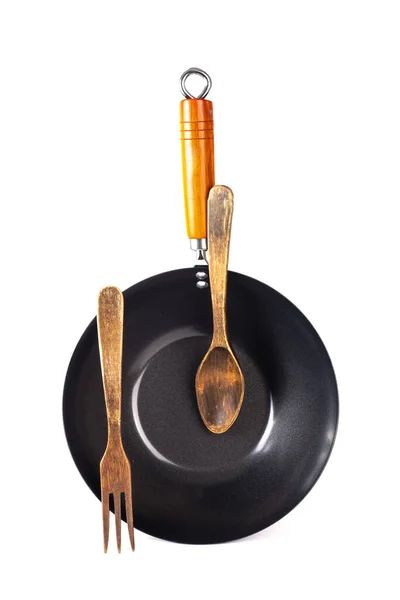 大黑锅 用木柄 勺子和叉子 白色烹调 — 图库照片