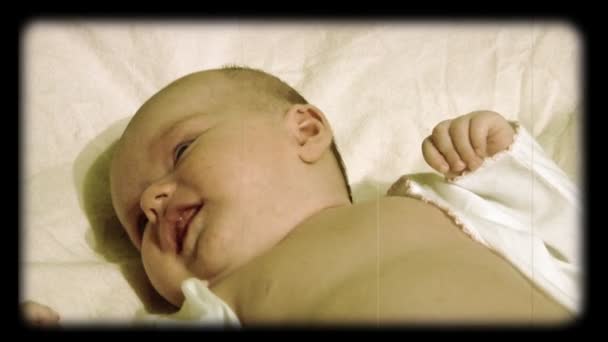 Newborn baby stylized at reel movie — Stock Video