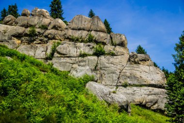 a rocks in place of Tustan fortress - a Medieval cliff-side fortress-city, archaeological and natural monument in Skole Beskids National Nature Park, Lviv region, Ukraine