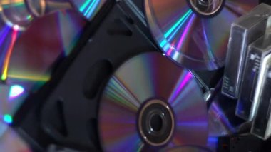 close-up a many compact discs and some hi-8, vhs and dv-cam video casettes panorama