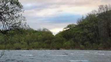 timelapse landscape of sunrise over the Opir river in the Carpathian, Skole Beskids National Nature Park, Lviv region of Ukraine