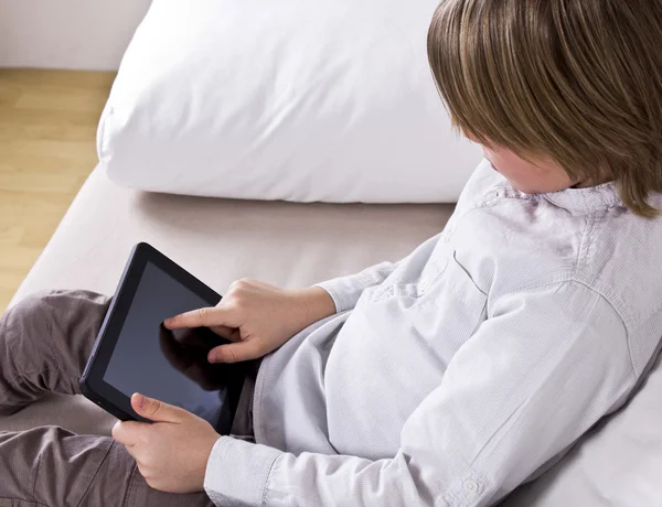 Kid holding digital tablet — Stock Photo, Image