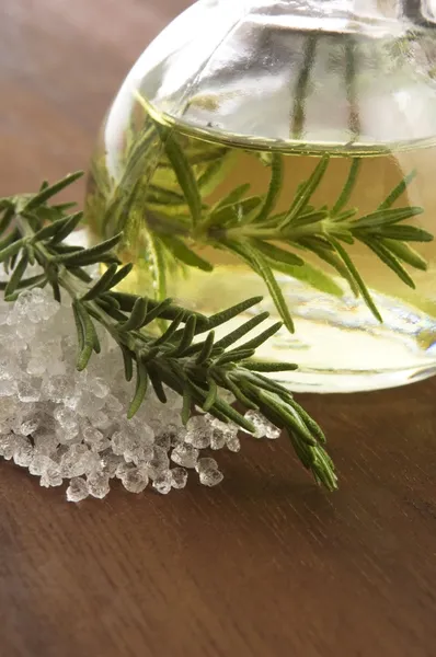 Essential Oil with rosemary and sea salt — Stock Photo, Image