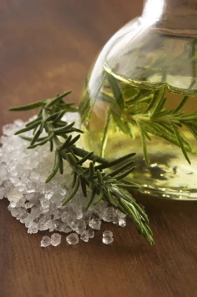 Essential Oil with rosemary and sea salt — Stock Photo, Image