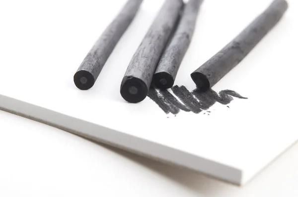 Artist's black charcoal with smudge — Stock Photo, Image