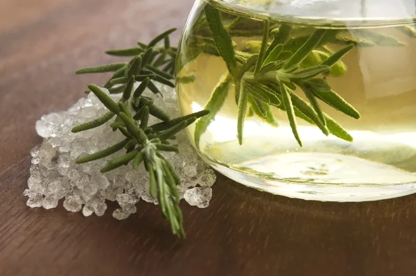 Essential Oil with rosemary and sea salt — Stock Photo, Image