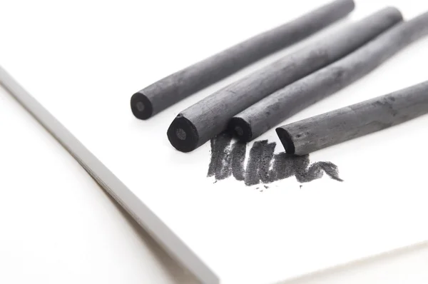 Artist's black charcoal with smudge — Stock Photo, Image