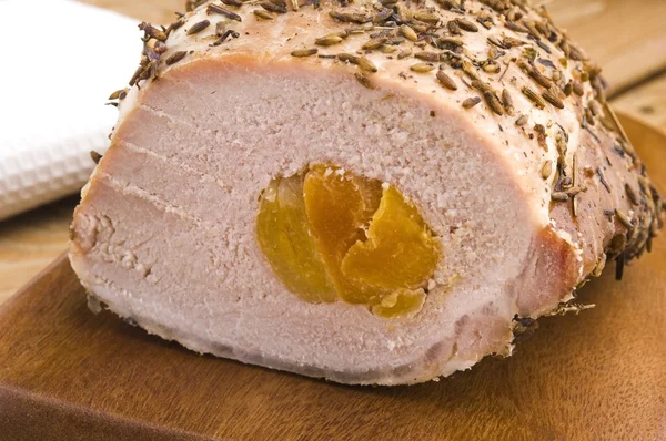 Roasted pork loin with dried apricots — Stock Photo, Image