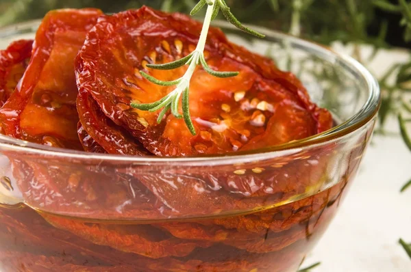 Sun dried tomatoes with olive oil — Stock Photo, Image