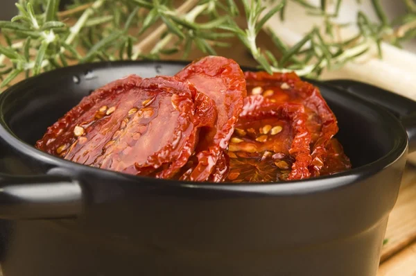 Sun dried tomatoes with olive oil — Stock Photo, Image
