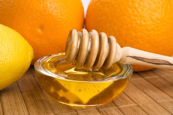 Świeży miód z owoców cytryny i pomarańczy — Zdjęcie stockowe