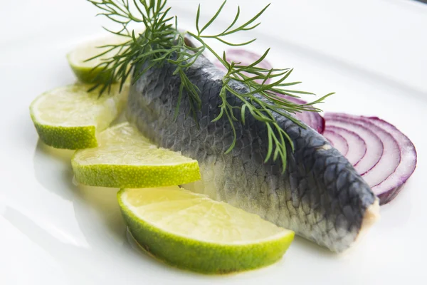 Fillet herring with onion and lemon — Stock Photo, Image