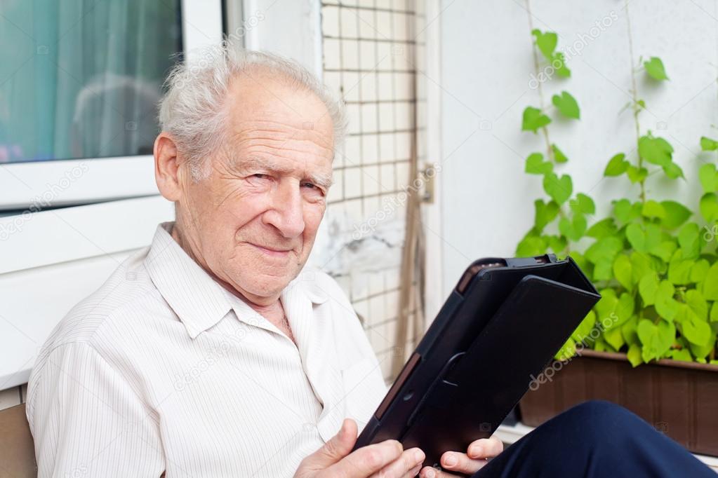 Old Man With a Touchpad PC