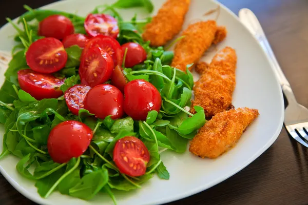 Chicken nuggets with salad — Stock Photo, Image