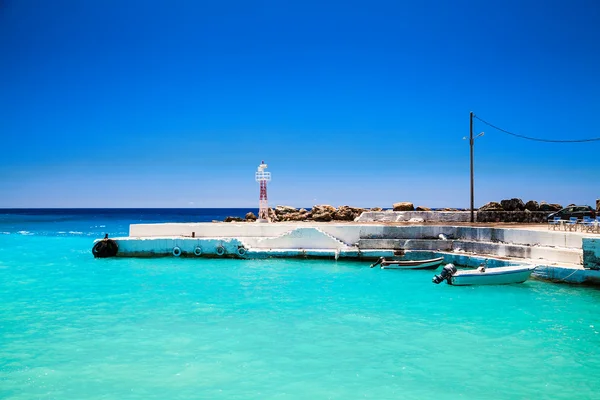 Muelle con faro —  Fotos de Stock