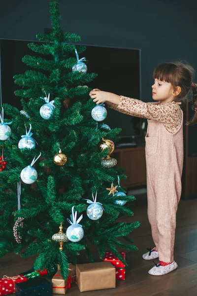 Little Girl Hanging Ornaments Balls Christmas Tree Kid Decorating Christmas — Stock Photo, Image