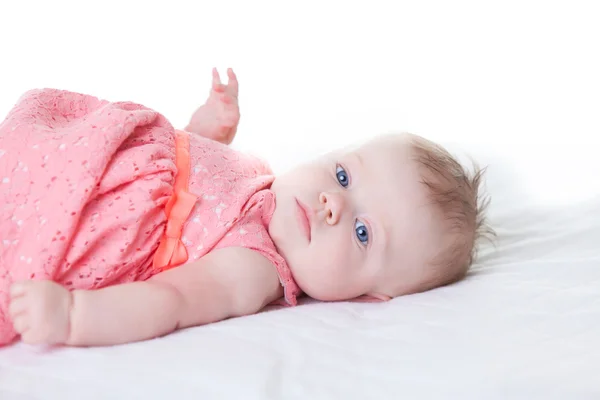Bebê-menina em vestido rosa — Fotografia de Stock