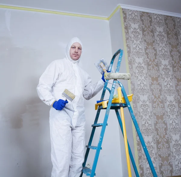 Painter man in white uniform — Stock Photo, Image