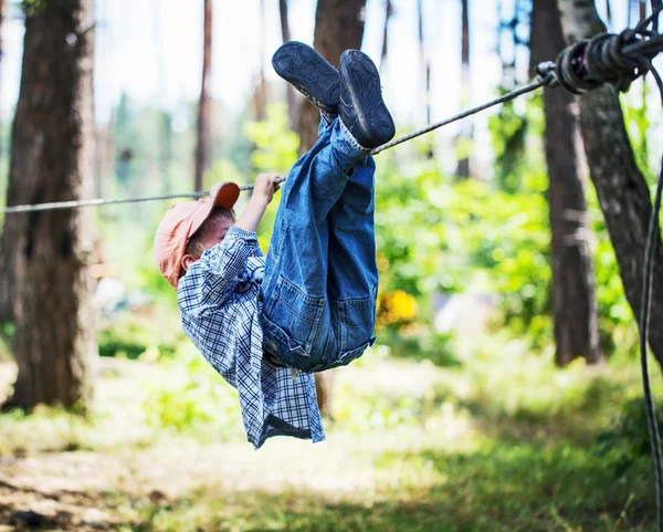 Child boy in adventure park — Stock Photo, Image