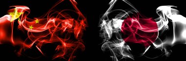 Flags of China, Chinese vs Japan, Japanese. Smoke flag placed side by side on black background. 