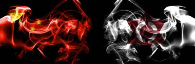 Flags of China, Chinese vs Japan, Japanese, Niki, Hokkaido, Shiribeshi, Subprefecture. Smoke flag placed side by side on black background. 