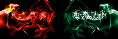 Flags of China, Chinese vs Saudi Arabia, Arabian. Smoke flag placed side by side on black background. 