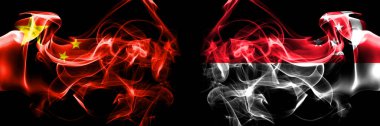 Flags of China, Chinese vs Singapore. Smoke flag placed side by side on black background. 