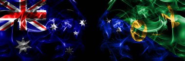 Avustralya bayrakları, Avustralya, Avustralya, Avustralya, Noel Adası. Duman bayrağı siyah arkaplanda yan yana yerleştirildi. 
