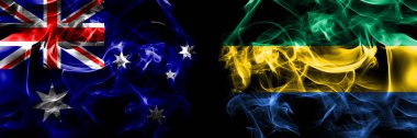 Avustralya bayrakları, Avustralya Gabon 'a karşı Gabonese, Gabonian. Duman bayrağı siyah arkaplanda yan yana yerleştirildi. 