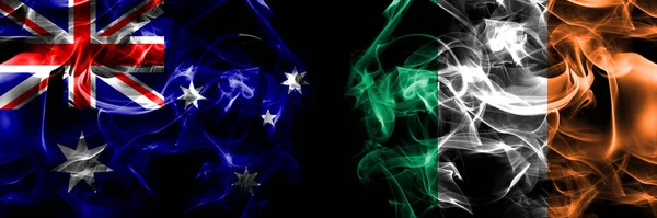 オーストラリア オーストラリア対アイルランド アイルランドの国旗 黒地に煙旗を並べて — ストック写真