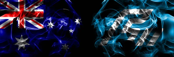 澳大利亚国旗 澳大利亚对日本 石川县 烟旗并排放置在黑色背景上 — 图库照片