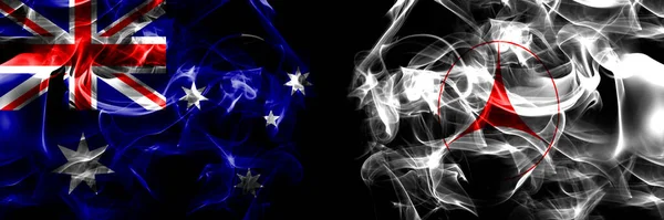 オーストラリアの国旗 オーストラリアVs日本 北海道 オホーツク サブ県 黒地に煙旗を並べて — ストック写真