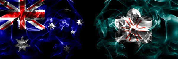 オーストラリアの国旗 オーストラリア対日本 佐賀県 黒地に煙旗を並べて — ストック写真