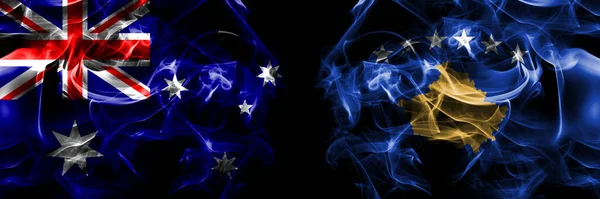 Flaggen Von Australien Australien Gegen Kosovo Kosovo Rauchfahne Nebeneinander Auf — Stockfoto