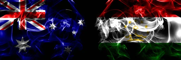 Bandeiras Austrália Austrália Tajiquistão Bandeira Fumaça Colocada Lado Lado Fundo — Fotografia de Stock